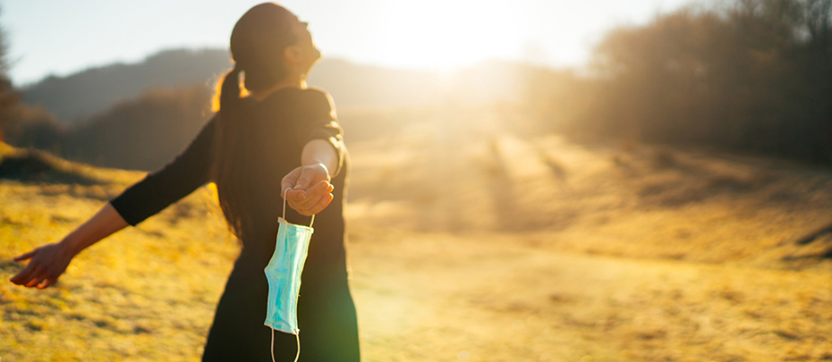 Woman enjoying outdoors without mask