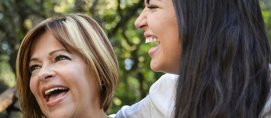 A middle-aged woman gazes confidently into the distance.